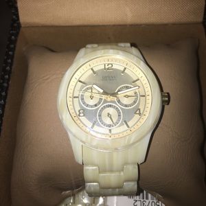 Gold color Guess watch